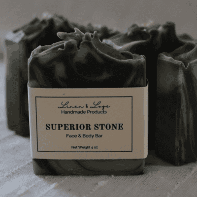 Superior Stone Soap Bar made made with tallow, activated charcoal, and bentonite clay.