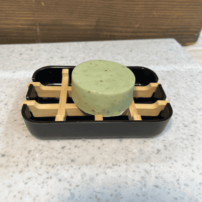 Eco Bamboo Soap dish in black with a bar of soap