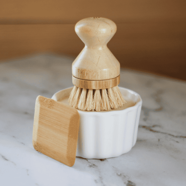 Dish Soap Bundle including 6oz dish soap in a white ramekin, dish brush, and bamboo food scraper