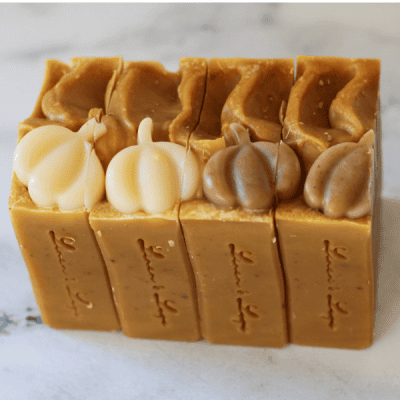 4 bars of pumpkin spice tallow handmade soap with soap pumpkins on top