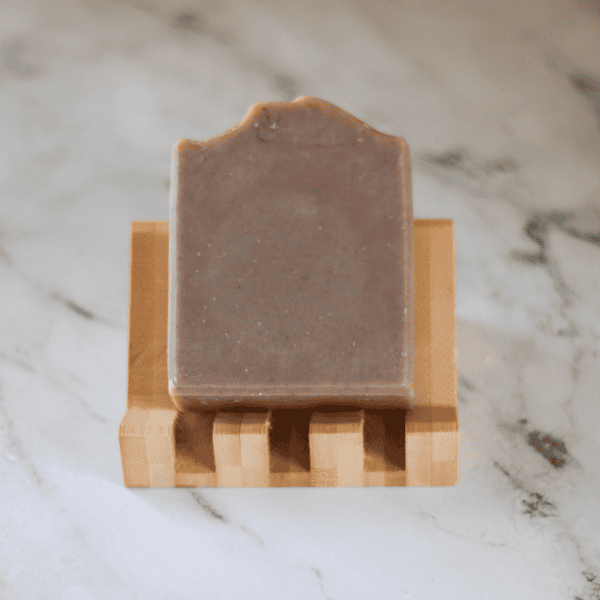 Bar of Lake Superior Sand tallow soap on a draining lift soap holder