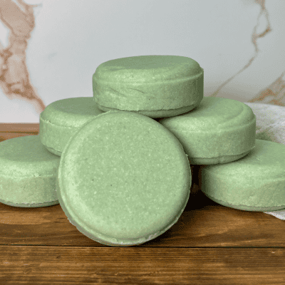 pyramid stack of green all hair types shampoo bars made by linen and logs